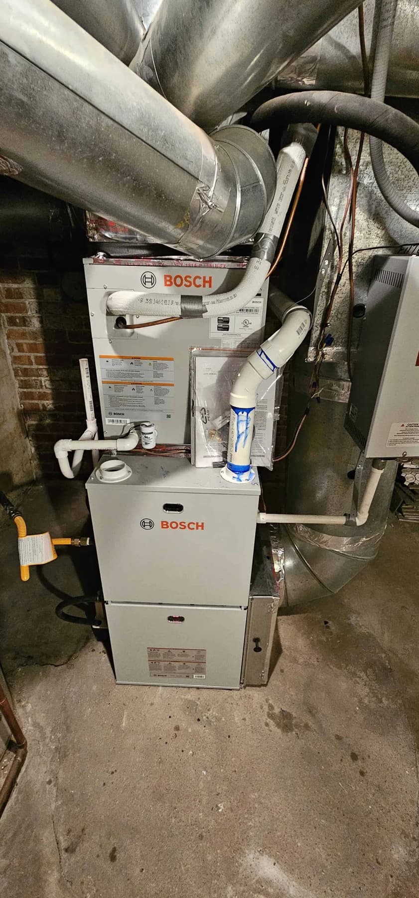 bosch furnace air handler mechanical room brick wall